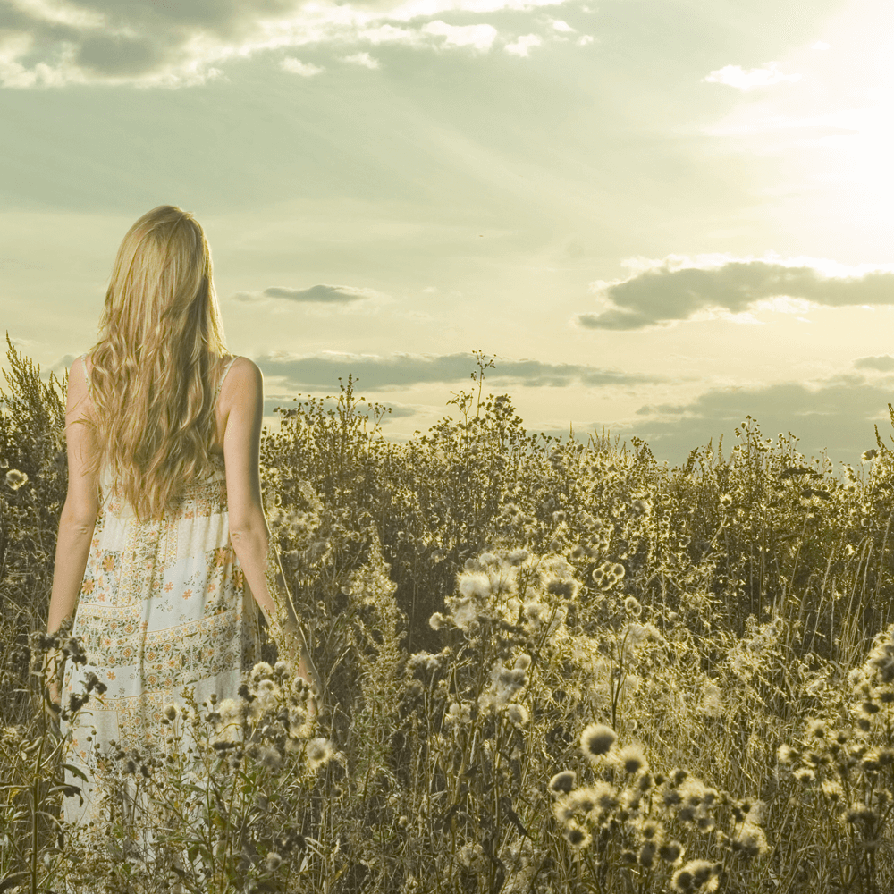 Beautiful girl in field